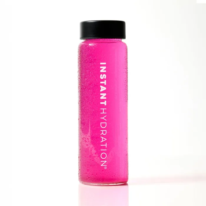 Water Bottle filled with pink electrolyte drink